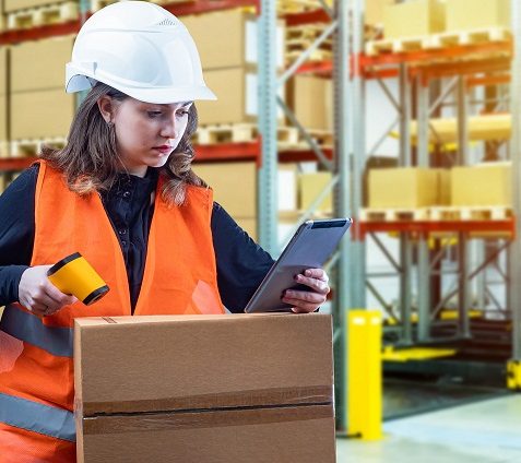 Warehouse,Worker.,Portrait,Of,Woman,With,Barcode,Scanner,At,Warehouse.